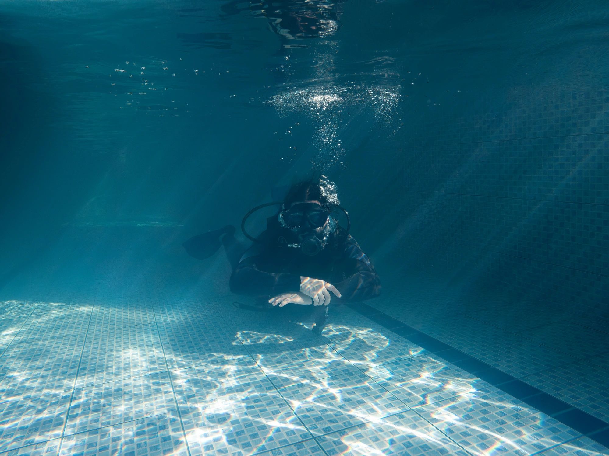 Mentor and student underwater
